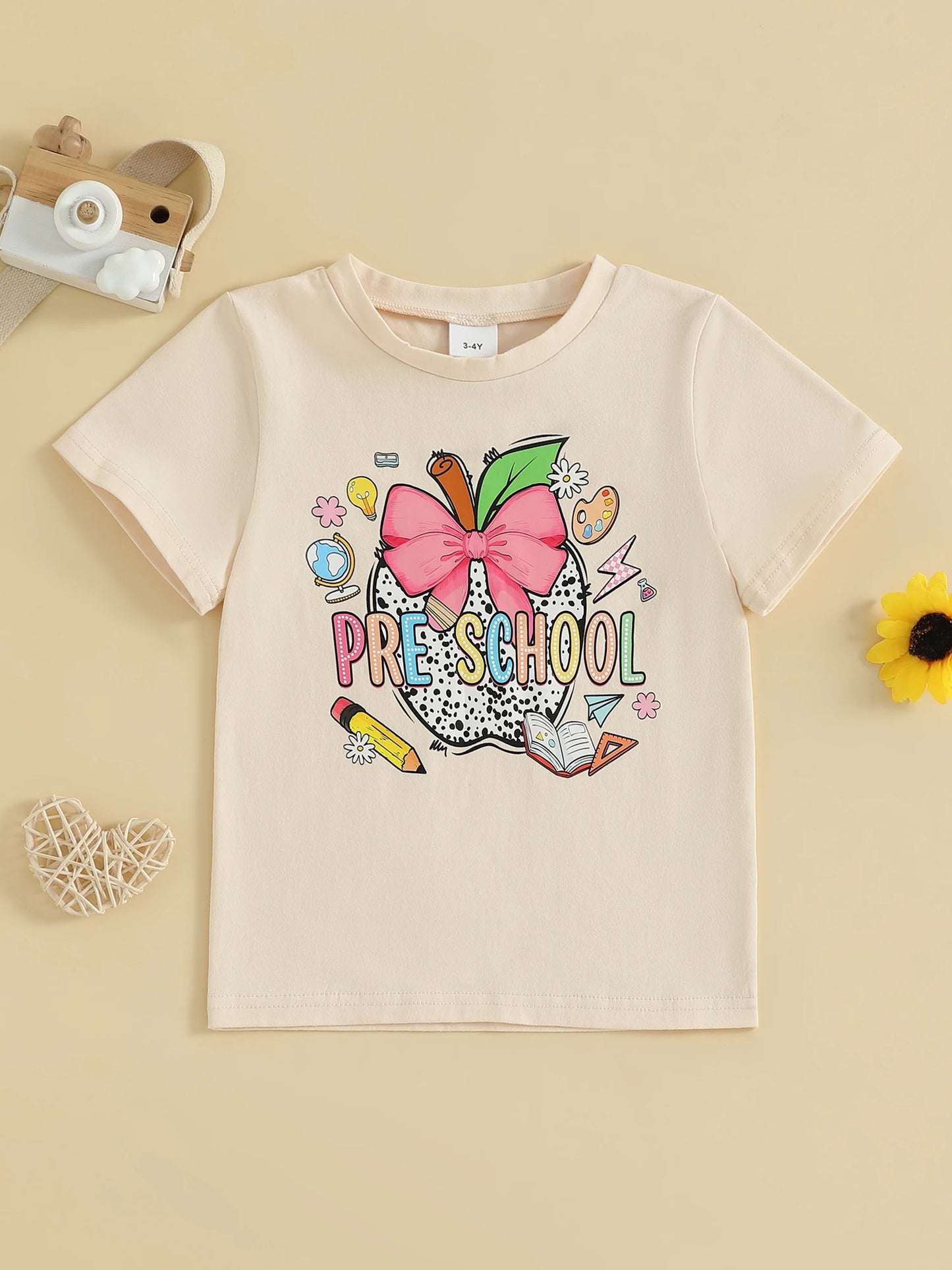 Children s Summer T-Shirt with Cute Apple and Bow Design Featuring Letter and Pen Print Short Sleeve Round Neck Graphic Tee